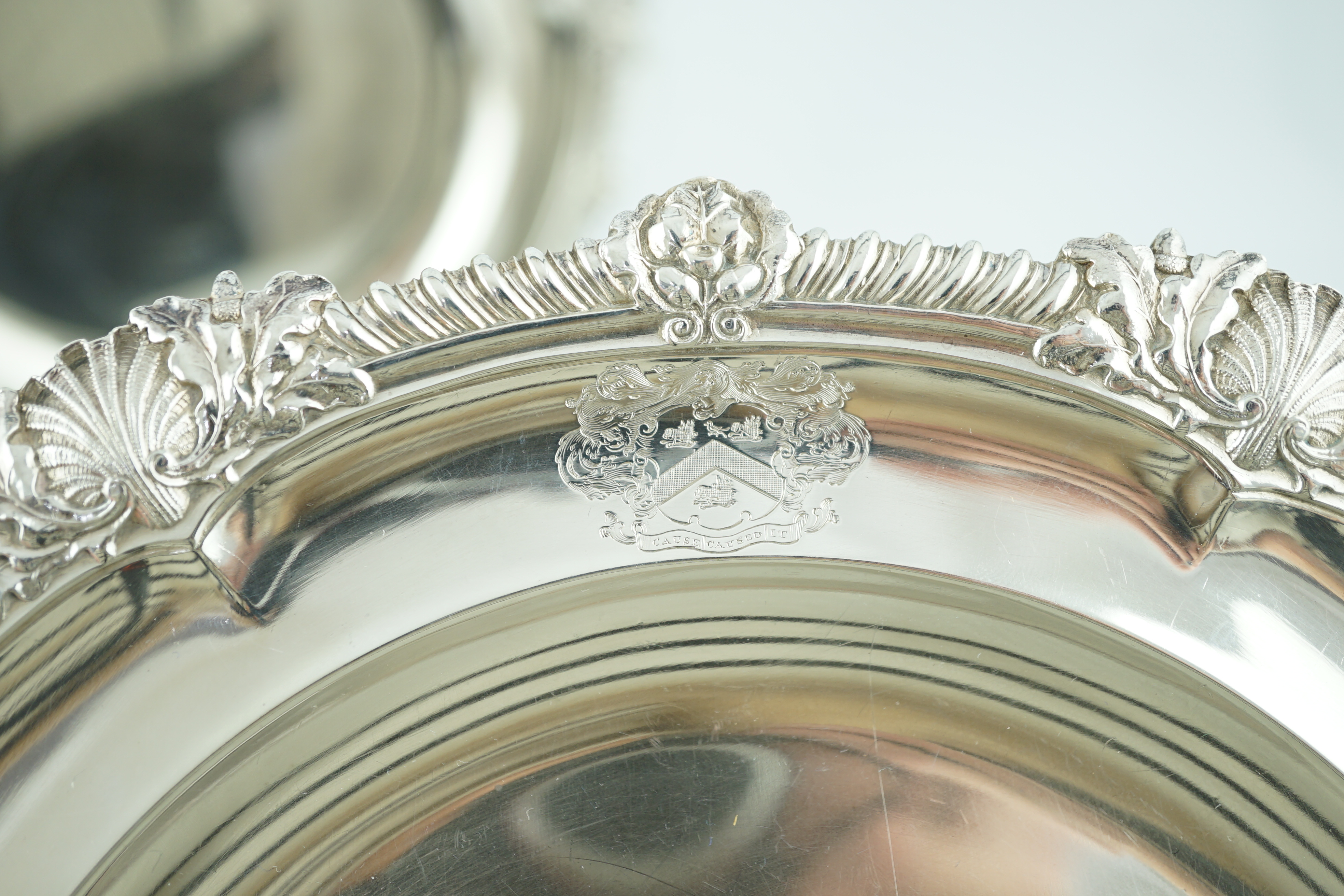 A set of four George IV silver dinner plates by Rundell, Bridge & Rundell